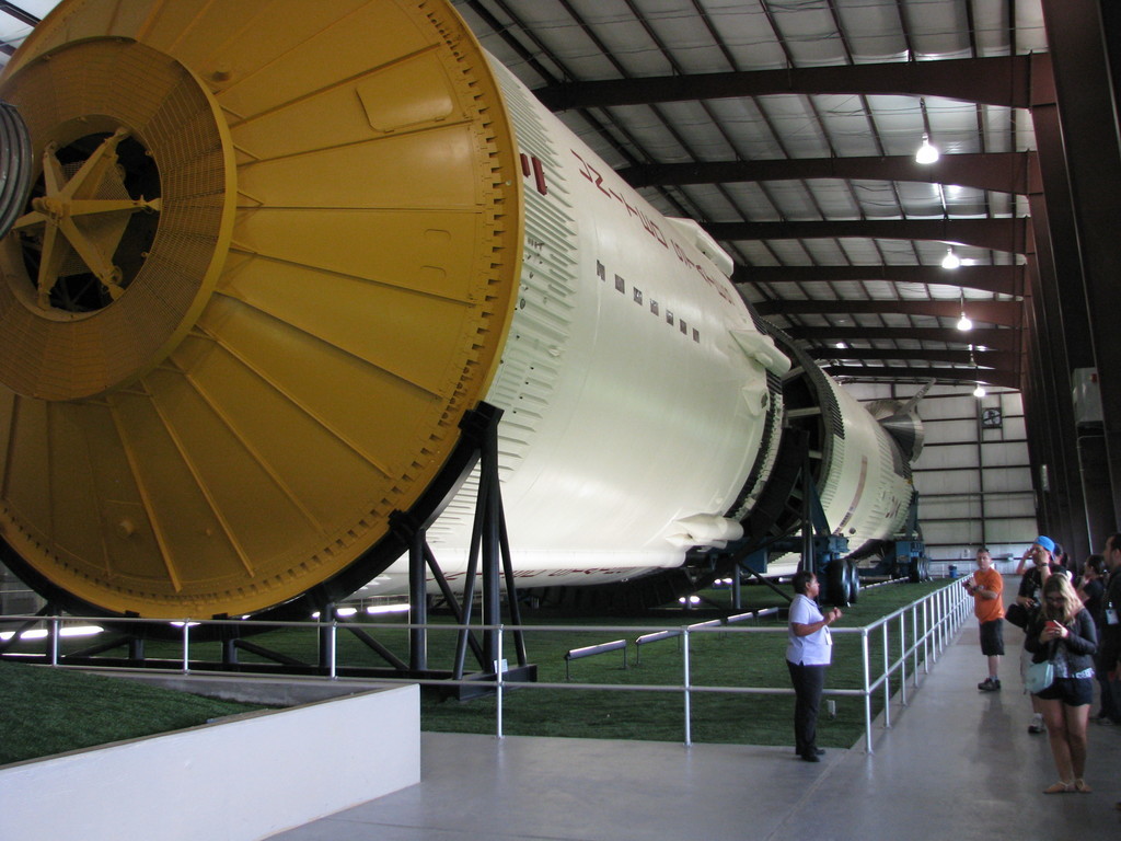 People for size next to the second stage (S-II).