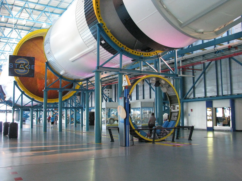 The Saturn V carried an independent guidance system for the ascent stage in the ring-shaped Instrument Unit (IU) standing on the floor here; this design proved critical when Apollo 12 was hit by lightning that knocked out all command module systems (but not the IU). For some reason, the unit shown here is a replica while the Udvar-Hazy center in Washington has an original; why isn't that one here?!?