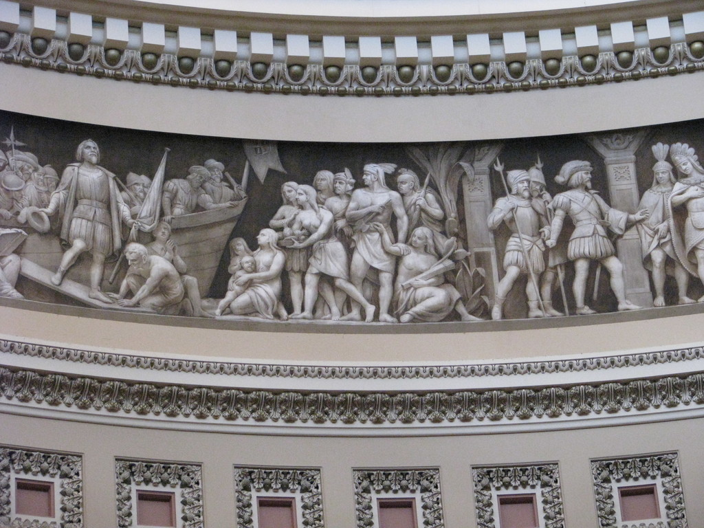 The magnificent Frieze of American History in the United States Capitol Rotunda. The figures, which are painted with only white, black and brown paint on a flat background, look unbelievable three-dimensional (a technique that's apparently called trompe-l'œil).