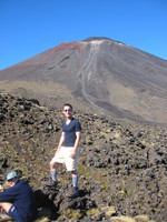 Me in front of Mt Ngauruhoe (AKA Mt Doom); the path leading up might be where Frodo climbed, but where is the entrance that leads to the fiery chasm with all the lava? Update: No, I am not growing breasts. It's just the picture and that tight polypro shirt.
