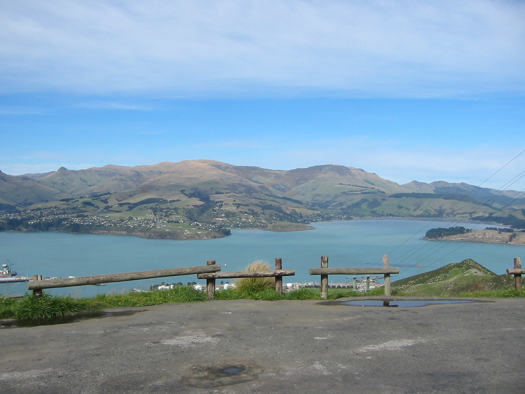 Christchurch's harbour Lyttleton Harbour, which is separated from Christchurch by the Port Hills, forming the beginning of the Banks Peninsula. The facilities are mostly concealed in the lower foreground.