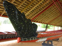Aft section of the waka, a smaller waka in the background.
