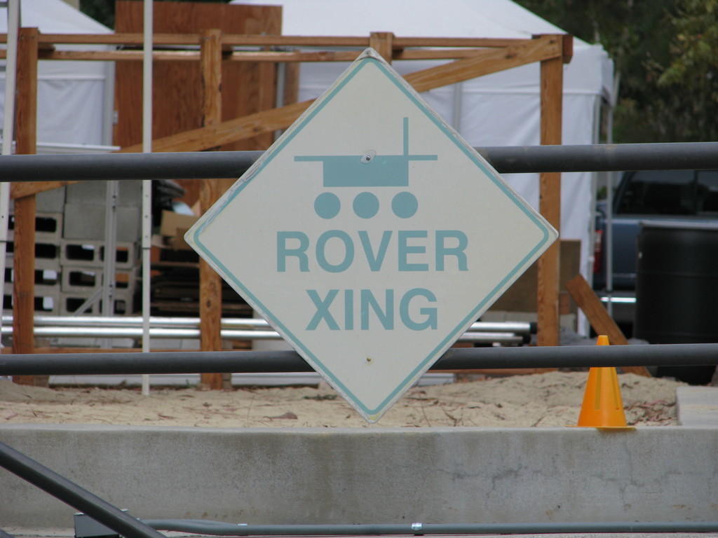 ROVER XING: A charming, and charmingly faded, sign near JPL's Mars Yard.