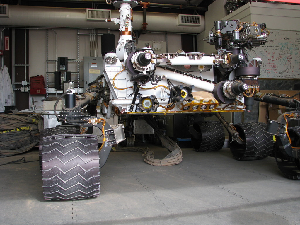 Curiosity's twin up close. Her wheels (with the JPL morse code visible) and her 30kg arm are impressive. The yellow tape is kapton tape; I'd come across the term many times in books, but had never seen it in real life.
