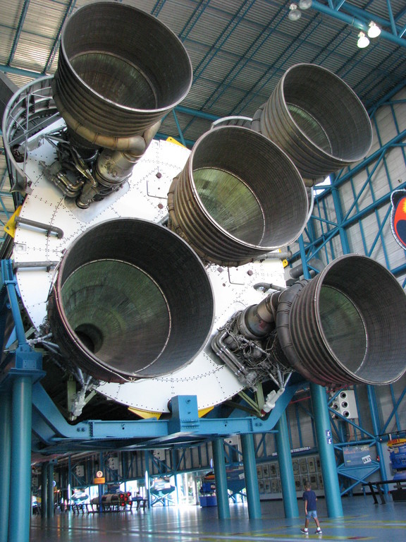 Saturn V's business end, with young person for scale.
