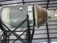 Closeup of the service module (grey) and command module (rusty). The SM provides propulsion and electrical power/consumables; the CM is the only part that returns to Earth. The launch escape system (far right) would be jettisoned at some point during ascent from the Earth.
