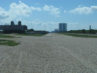 View down the crawlerway that goes between the VAB and launch complexes 39A/39B.