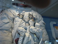 The space suit that Gene Cernan wore on the Moon during Apollo 17, with grey lunar dust still adhering to it.