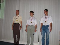 the three gold medalists: Peter Bella from Slovakia and two romanians