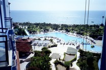 View over the pool and the beach from the top floor of the hotel.