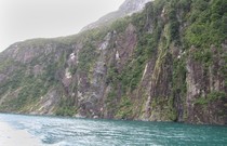 Steep fiord slopes formed by glaciers, at Milford Sound.