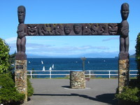 Lake Taupo, seen through an archway with Maori style ornaments