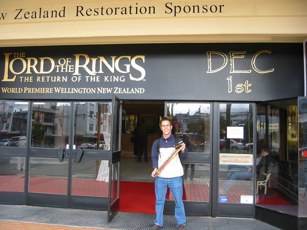 Me in front of Embassy Theatre, with two newly bought Lord of the Rings posters and tickets for tonight's show of the first part.